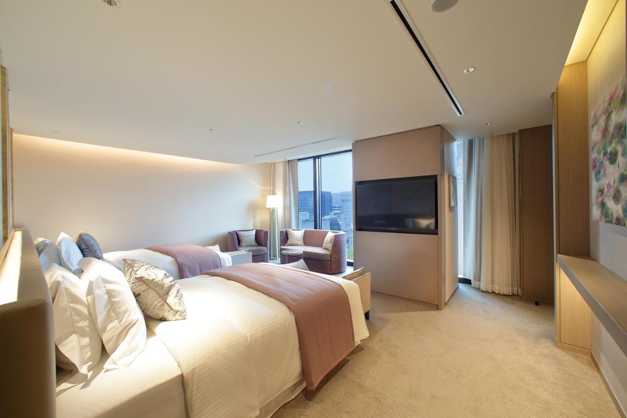 Miyako Hotel Hakata Fukuoka  Exteriör bild A bedroom at the hotel